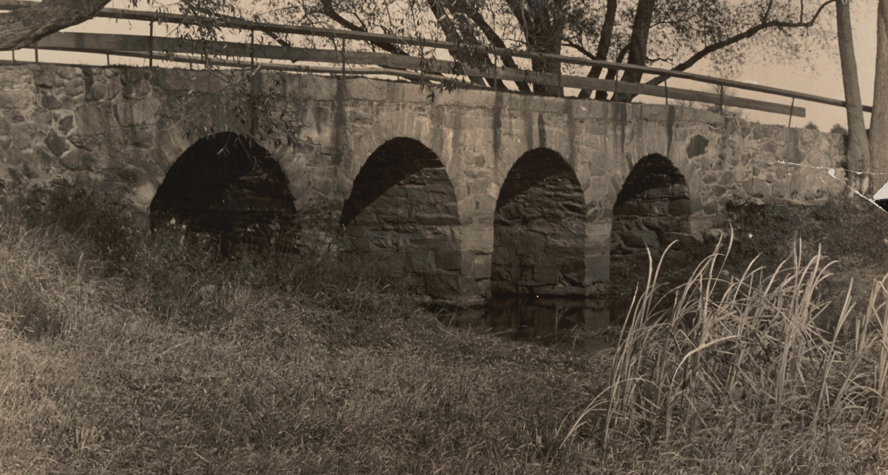 FOUR ARCHES– The Four Arch Bridge over the Sudbury River on Old Sudbury Road, in a photo taken by Alfred Wayland Cutting between 1880 and 1930.